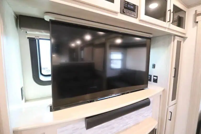 Flat-screen TV mounted in RV interior