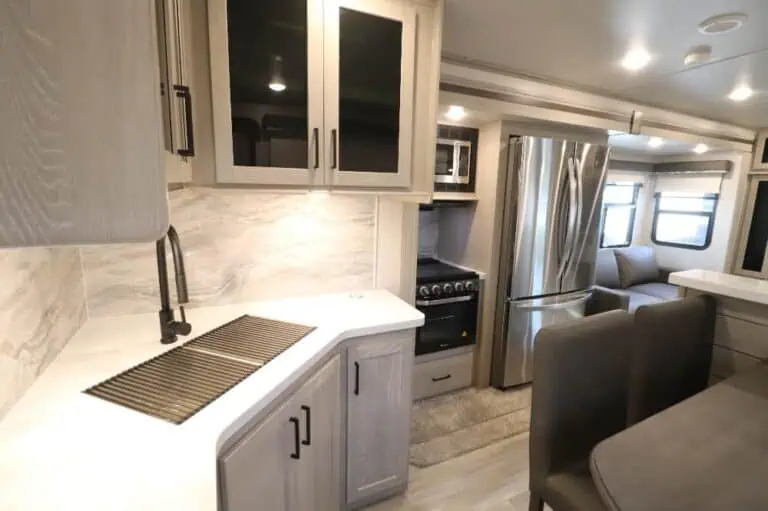 Modern RV kitchen with stainless steel appliances