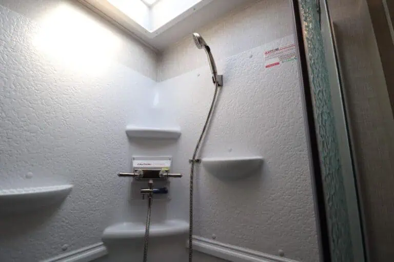 Modern shower area with hand-held showerhead