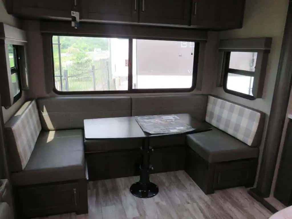 RV dinette area with table and seating.