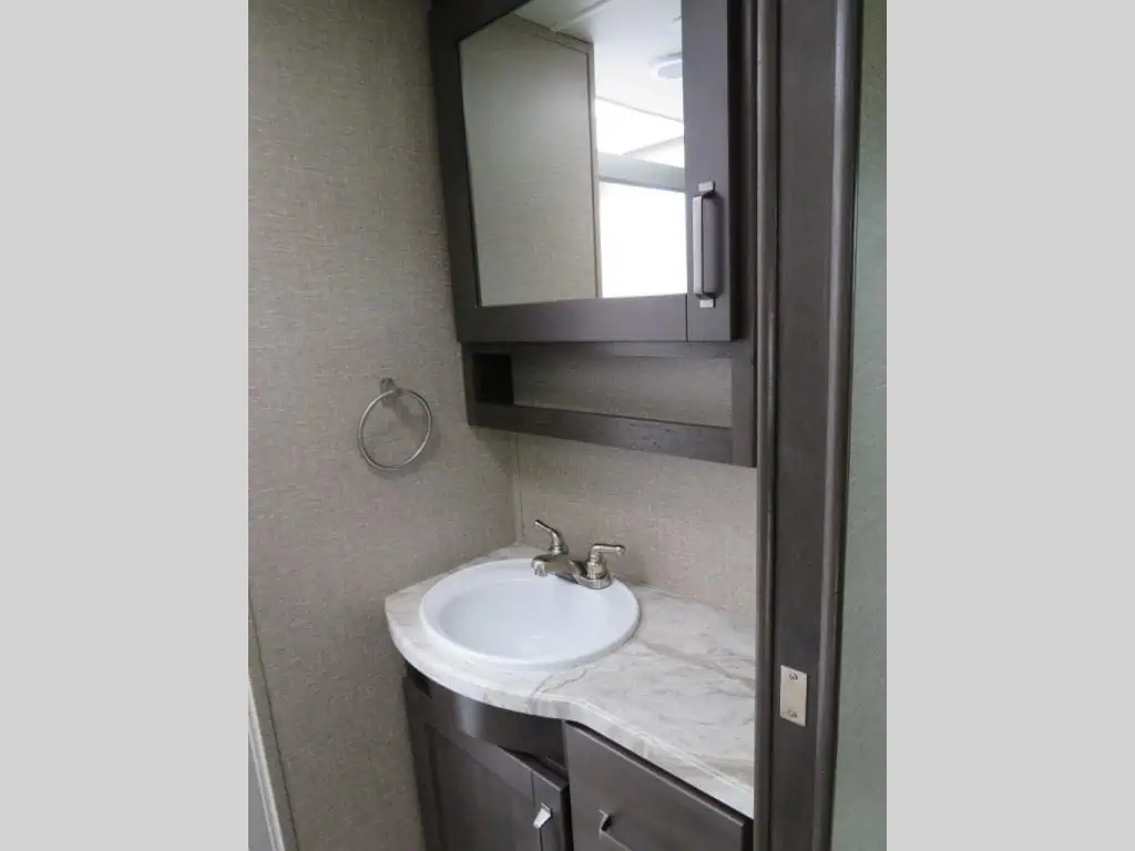 Modern bathroom sink with mirror and cabinet